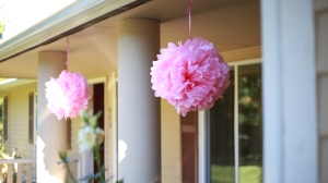 Hang some tissue puffs outside to welcome your guests! 